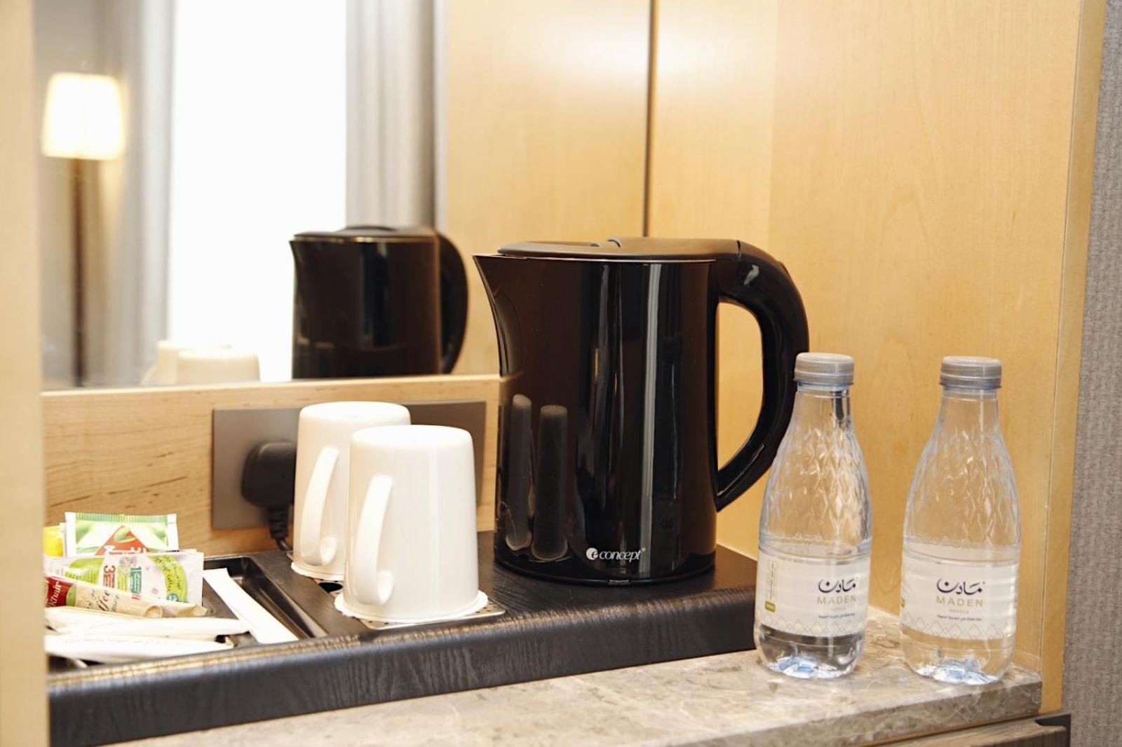 Hotel Maden Alrawda Medina Esterno foto A kettle in a hotel room