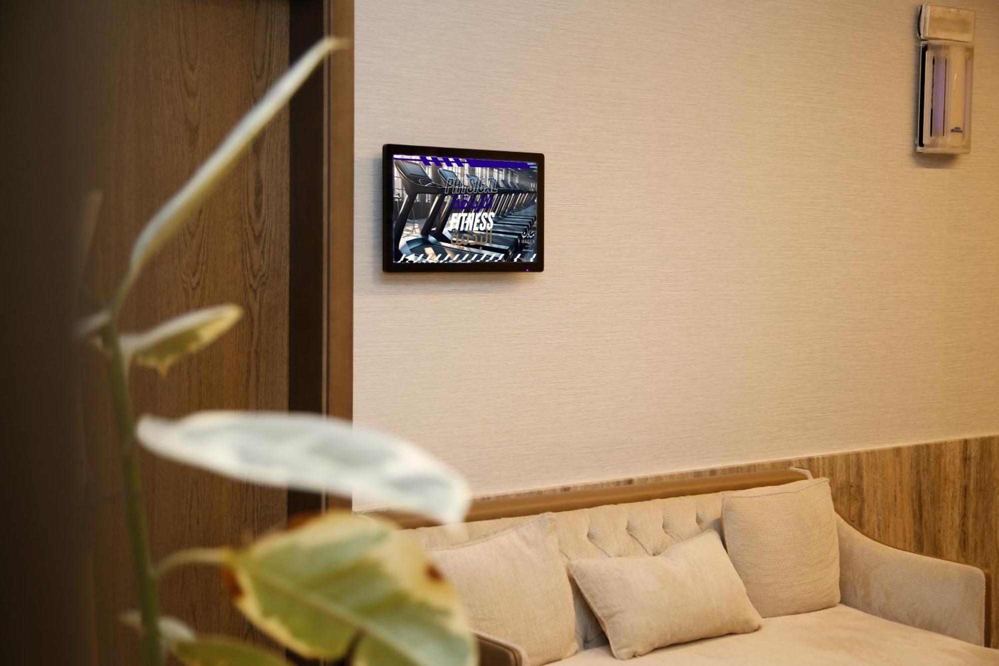 Hotel Maden Alrawda Medina Esterno foto A wall-mounted tablet